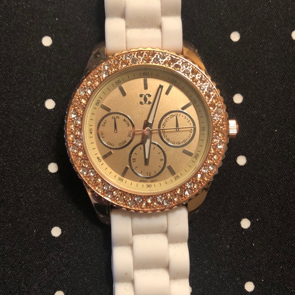 Charming Charlie Gold with white wristband watch